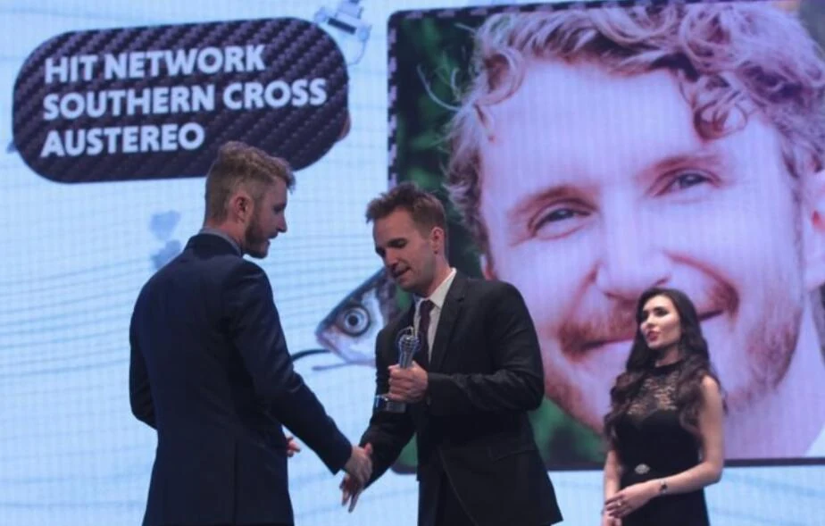 Jez receiving an award